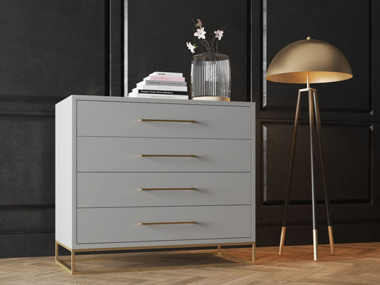 Chest of DrawersAdd a touch of luxury to your home with our Glossy Wood Chest of Drawers. Featuring a glossy white finish and gold accents, this chest boasts four drawers for ample Luxe Living InteriorsGlossy Wood Chest