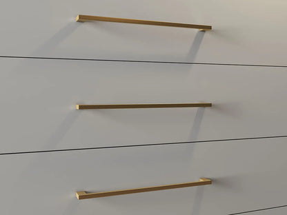 Chest of DrawersAdd a touch of luxury to your home with our Glossy Wood Chest of Drawers. Featuring a glossy white finish and gold accents, this chest boasts four drawers for ample Luxe Living InteriorsGlossy Wood Chest